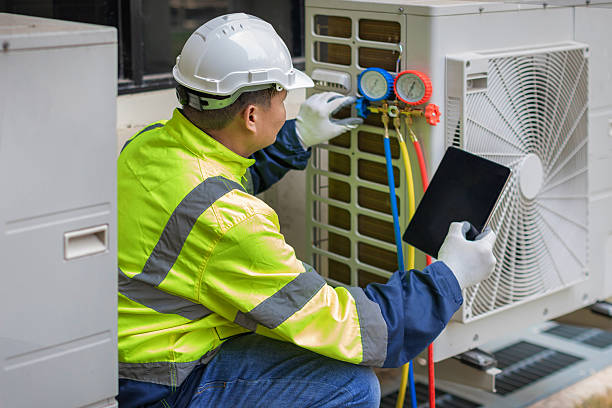 Professional Hvac technician working in Hayes, VA